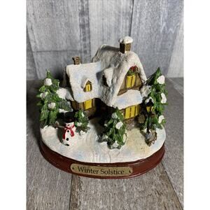 winter solstice lighted seasonal cottage Village